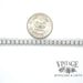 14 karat white gold 7 ctw natural diamond tennis bracelet, shown with quarter for size reference
