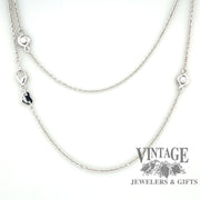 Hearts on Fire 18 karat white gold 40” diamond station chain necklace