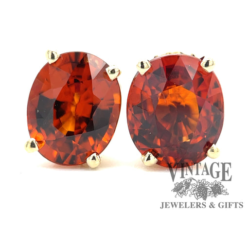 14 karat yellow gold Spessartine orange garnet pierced stud earrings