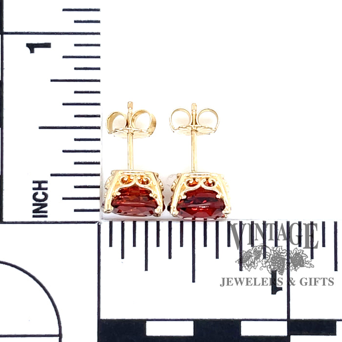 14 karat yellow gold Spessartine orange garnet pierced stud earrings, with scale