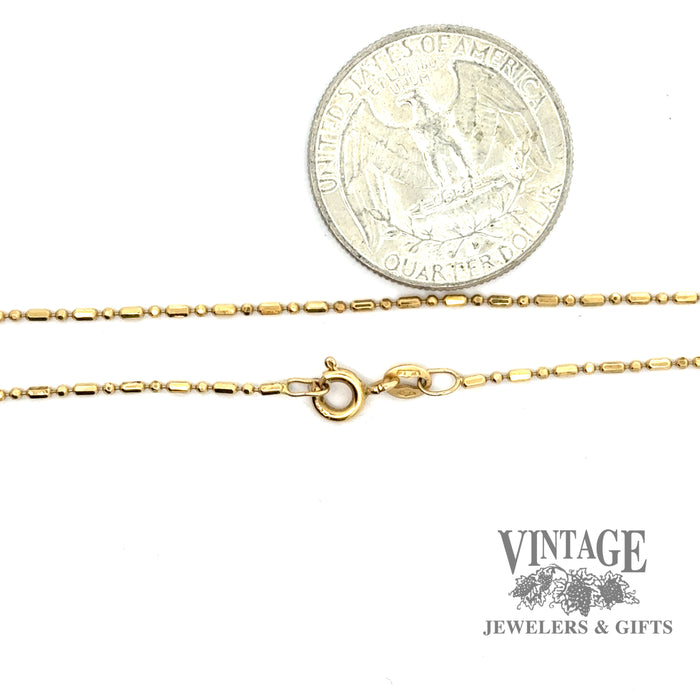 18ky gold 20” Bead chain 1.2mm shown with quarter for scale