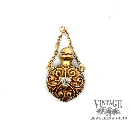 Antique 21k yellow gold embossed scroll and diamond perfume pendant