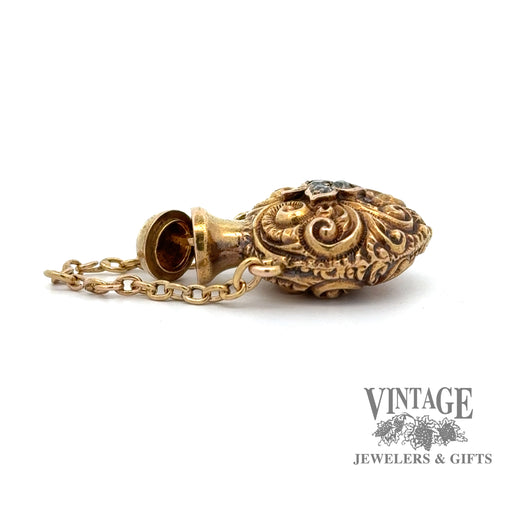 Antique 21k yellow gold embossed scroll and diamond perfume pendant, side view