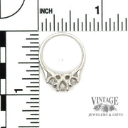 Three stone diamond decagon brilliant cut platinum ring scale