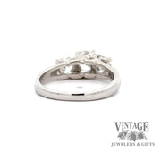 Three stone diamond decagon brilliant cut platinum ring bottom