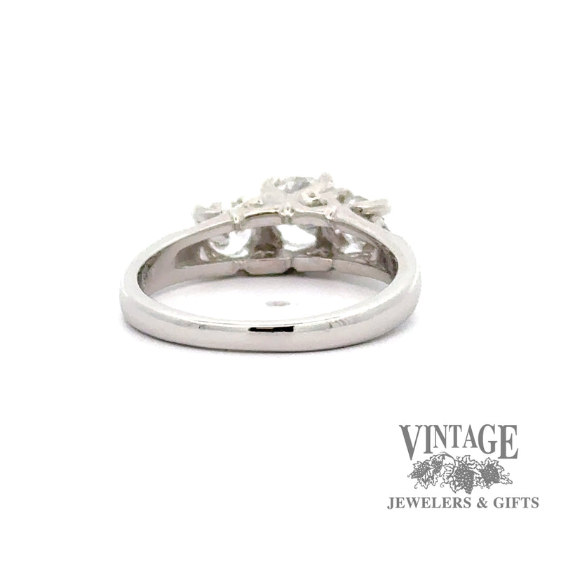Three stone diamond decagon brilliant cut platinum ring bottom