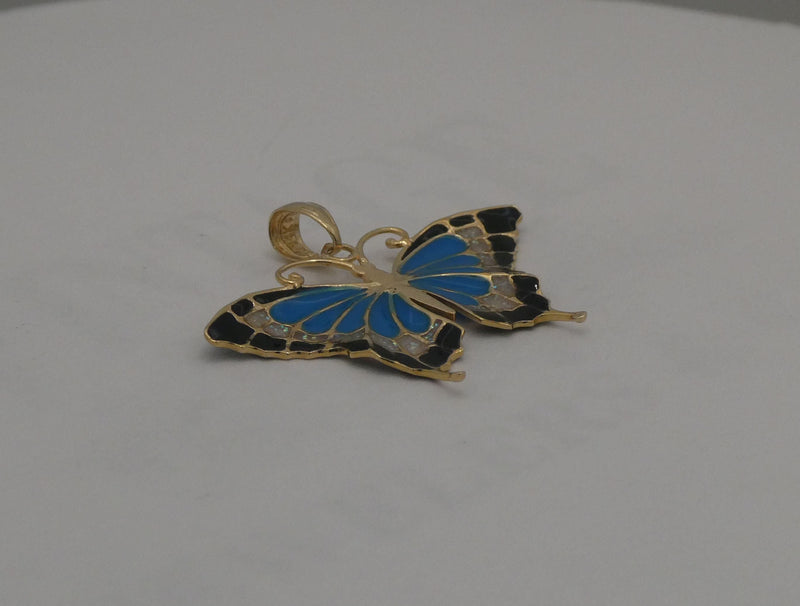 14 karat yellow gold butterfly pendant.