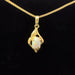 White opal set in 18k yellow gold pendant