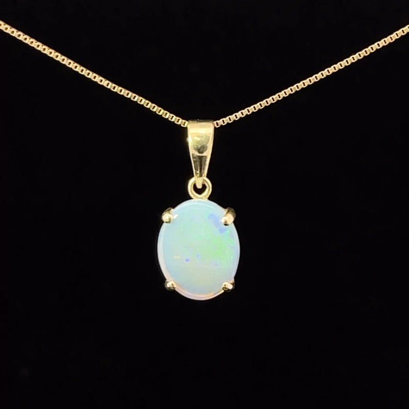White opal 14k gold solitaire pendant
