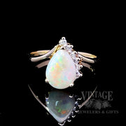 Pear shaped opal and diamond ring
