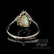 Pear shaped opal and diamond ring bottom