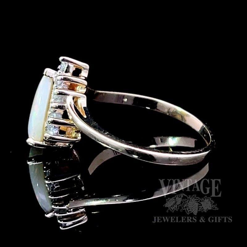 Pear shaped opal and diamond ring side1