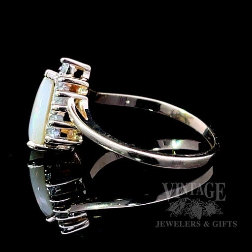 Pear shaped opal and diamond ring side1