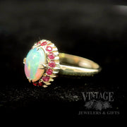 Opal and ruby 11k gold ring perspective