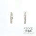 Front 14k white gold oval huggie diamond earring