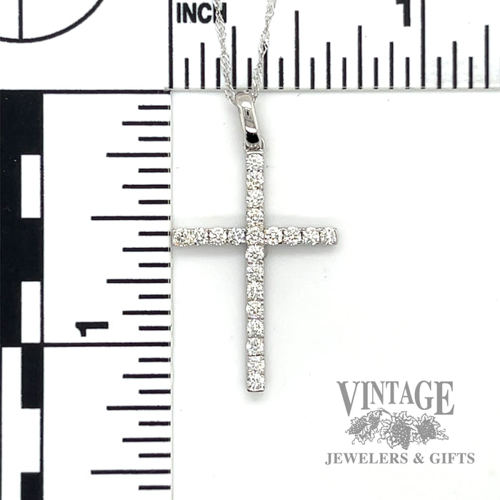 Diamond and 14kw gold cross 18" necklace.