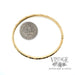 Twisted stripe 14k yellow gold bangle bracelet scale