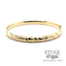 Twisted stripe 14k yellow gold bangle bracelet