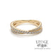 14k yellow gold ring of crossing bands of diamonds