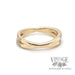 14k yellow gold ring of crossing bands of diamonds bottom