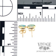 Boulder Opal stud earrings in 14k yellow gold scale