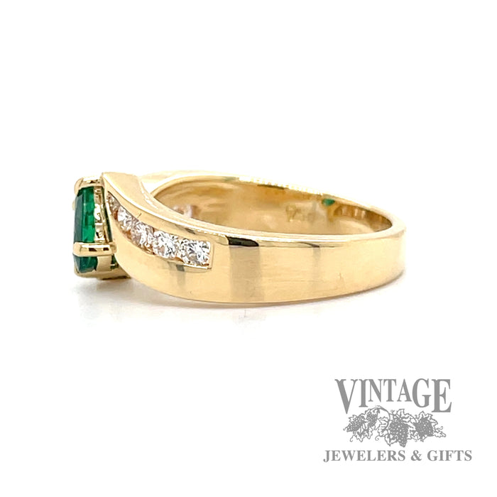 Emerald and diamond accents set in 18k yellow gold bypass ring side1