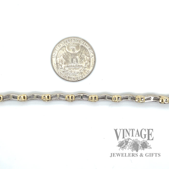 7" 1.05 ctw diamond accent yellow and white gold tennis bracelet scale