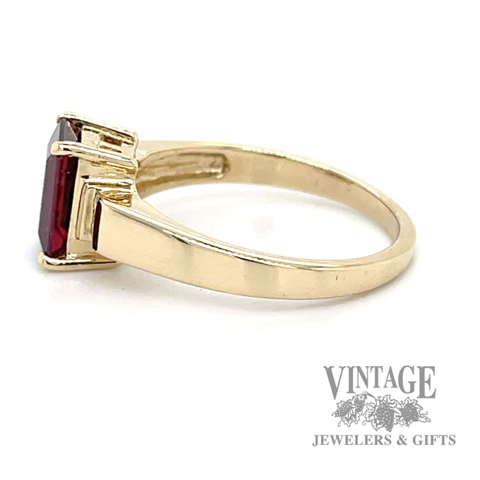 1.5ct garnet with diamond accents in 14k yellow gold ring side