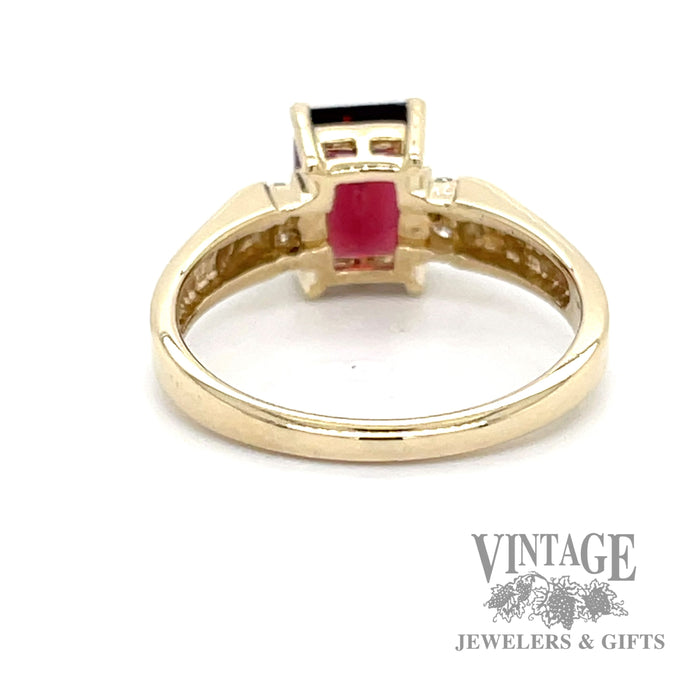 1.5ct garnet with diamond accents in 14k yellow gold ring bottom