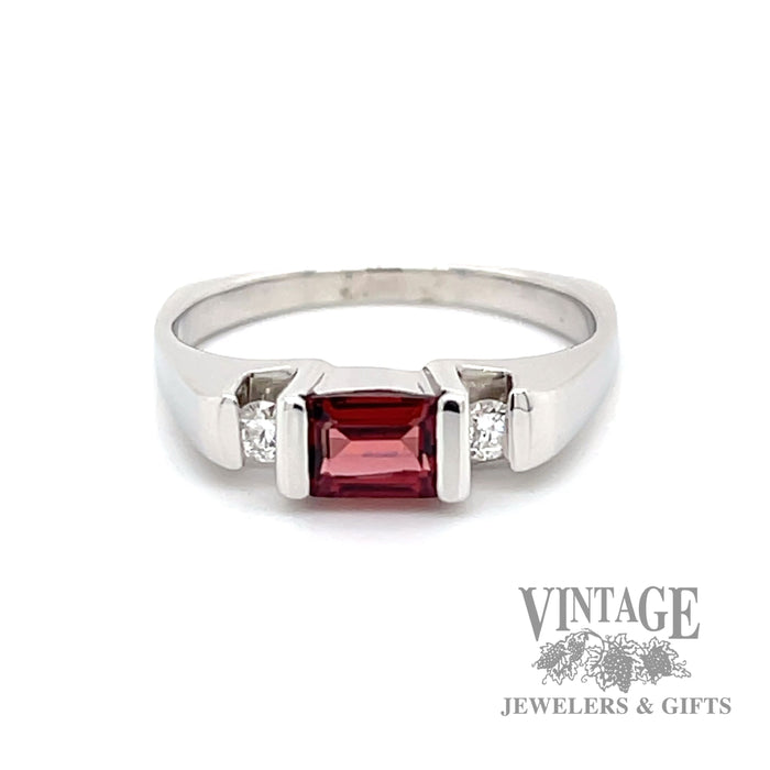 Emerald cut garnet with diamond accents in 14k white gold ring