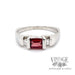 Emerald cut garnet with diamond accents in 14k white gold ring