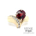 2.1 carat garnet with diamond accent freeform ring of 14k yellow gold