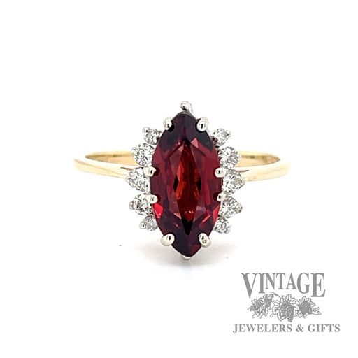 1.8ct garnet ring with diamond accent halo set in 14k gold