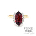 1.8ct garnet ring with diamond accent halo set in 14k gold