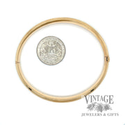 Polished 14k gold hinged bangle bracelet scale