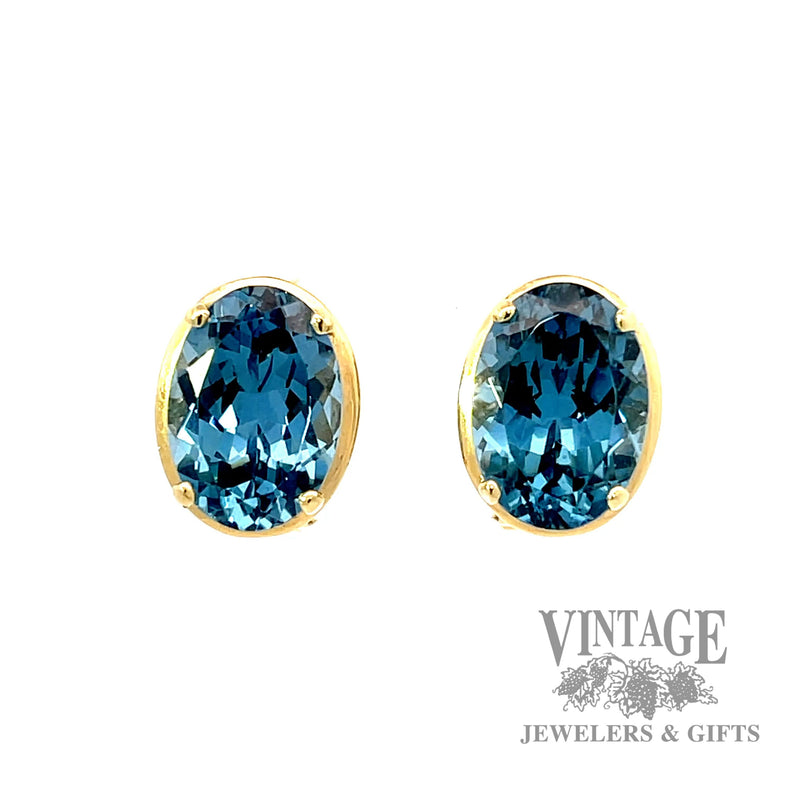 Blue topaz and 14k gold clip on earrings