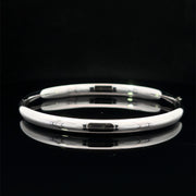 Polished 14k white gold hinged bangle bracelet