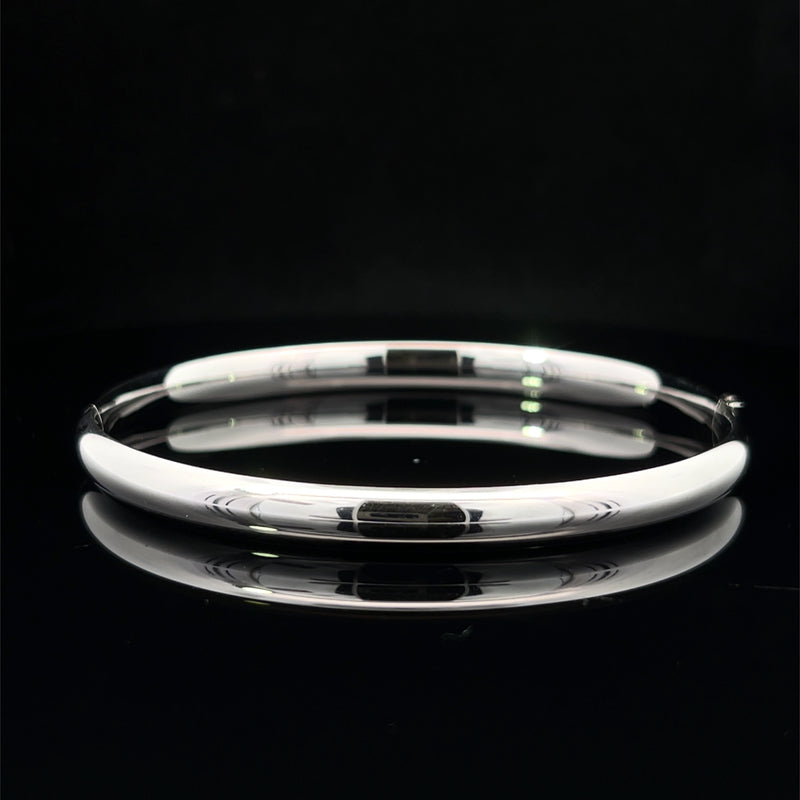 Polished 14k white gold hinged bangle bracelet