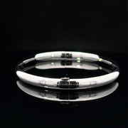 Polished 14k white gold hinged bangle bracelet side closed