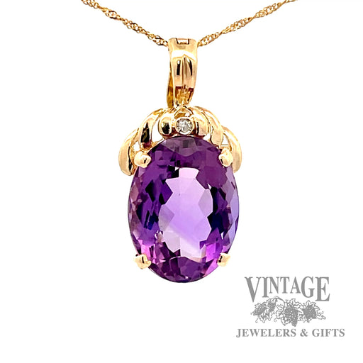 Oval amethyst and diamond 14k gold enhancer pendant