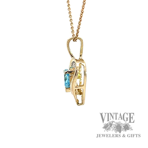 Blue topaz & diamond accent 14k gold heart pendant side