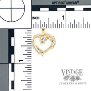 Diamond cluster 14k gold heart pendant back and scale