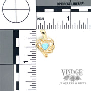Blue topaz & diamond accent 14k gold heart pendant back and scale