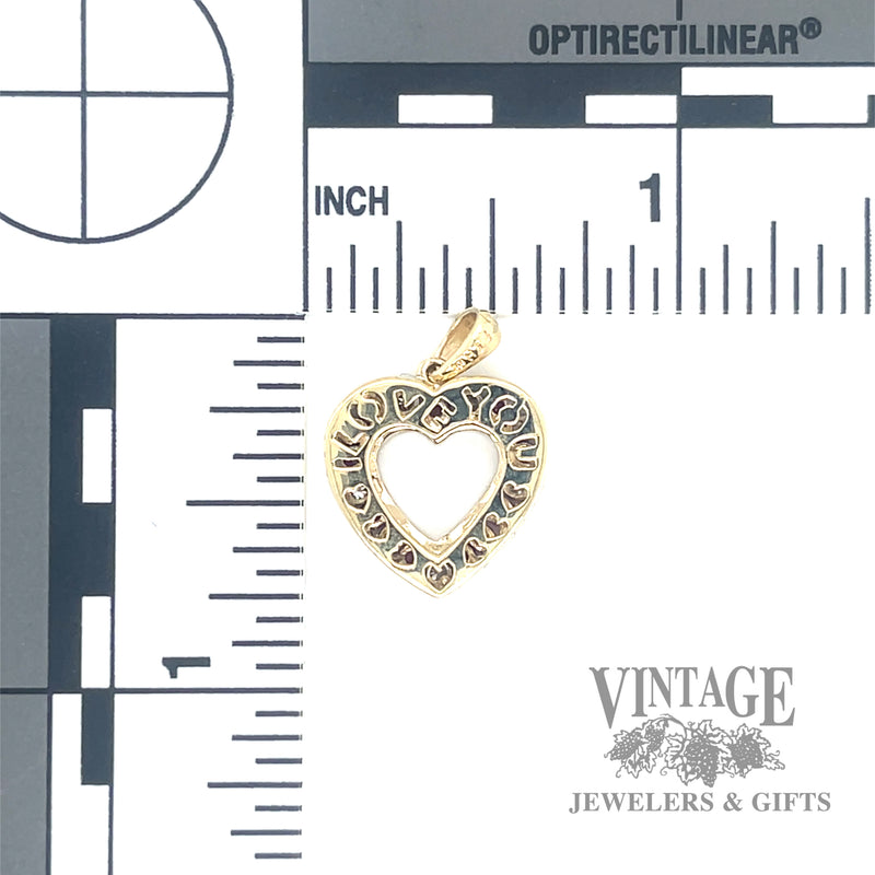 Ruby and diamond 10k gold heart pendant back and scale