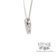 Diamond platinum open heart slide pendant side