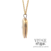 Diamond 14k gold heart locket side