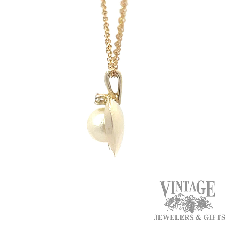 Pearl and diamond 14k gold heart pendant side