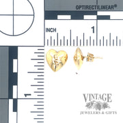 14k gold polished heart stud earrings back and scale