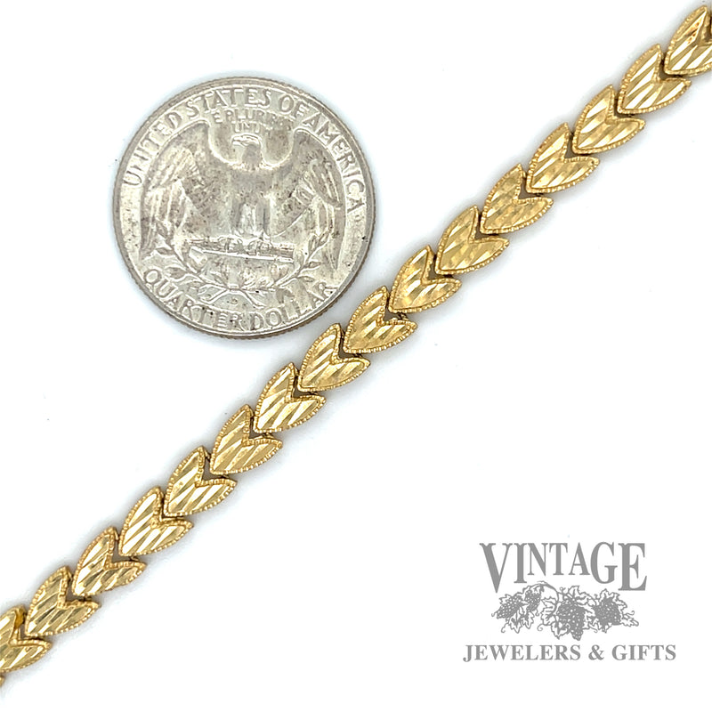 7.25" heart link 14k gold bracelet scale