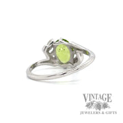 Peridot and diamond 14k white gold bypass ring bottom